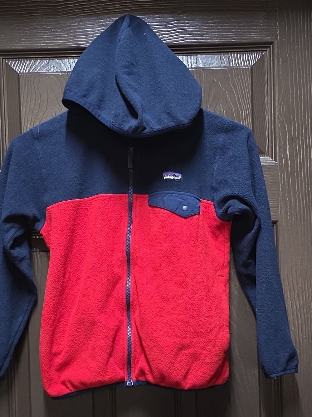 Patagonia Navy Fleece with Red Trim and Multicolor Logo